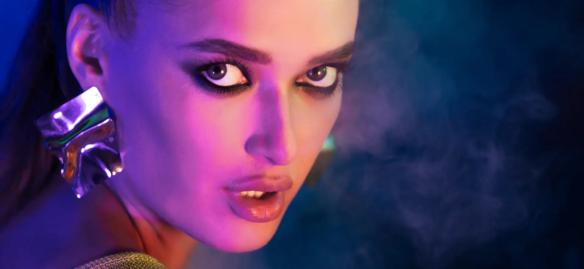portrait-of-woman-in-neon-blue-smoke-2022-10-07-01-19-22-utc copy